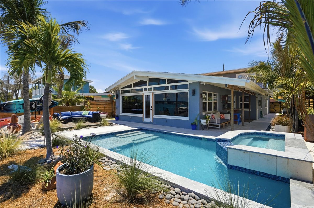 Waterfront pool at Beach and Bay Getaway